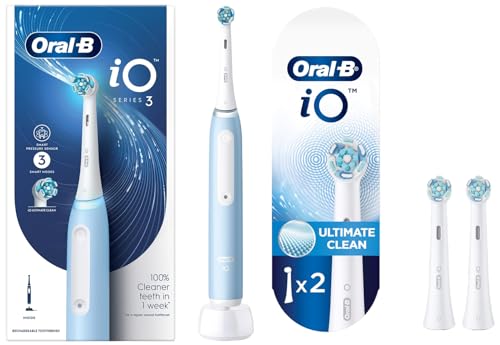 Image of Oral-B iO3 Ultimate Electric Toothbrush For Adults, 3 Smart Modes, Round Brush Head (Blue) With Original iO Electric Toothbrush White Replacement Brush Heads, Pack Of 2 Refills