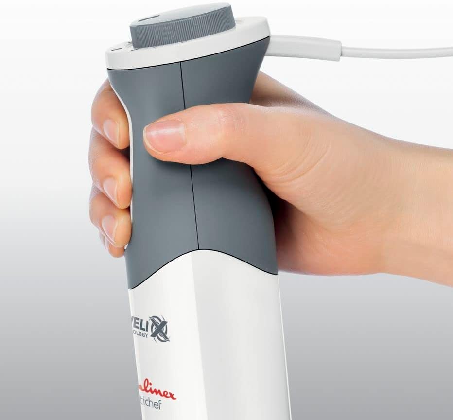 Hand holding Moulinex Optichef Hand Blender