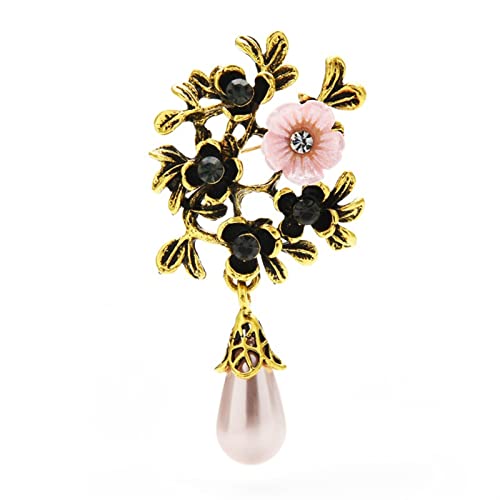 Broche fleur en coquille et perle goutte de haute joaillerie