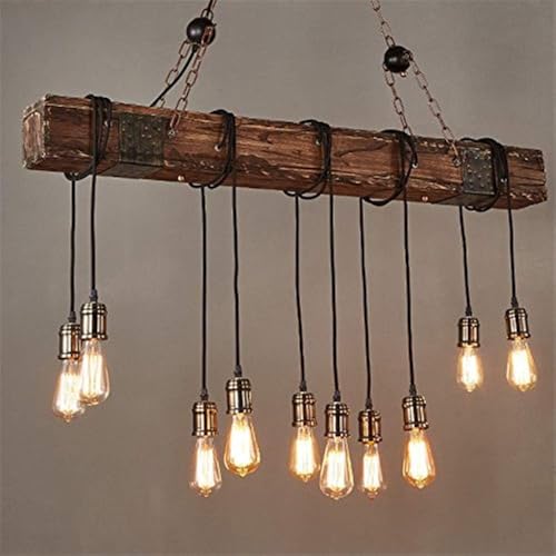Lustre éclairage plafond restaurant et grand îlot en bois