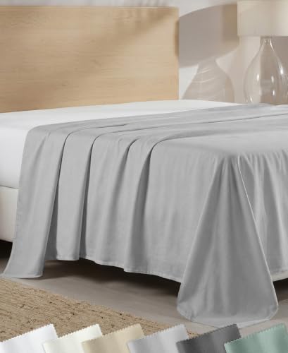 Light grey 100% cotton sateen full flat sheet with a 4-inch pleated hem — sold on its own, so it layers over wedges without a fitted corner to fight