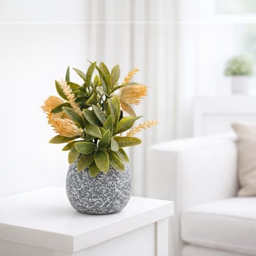 Image of Garden Art Artificial Protea Flower Arrangement Placed in a Small Decorative doted Pot. The Spiky, Cone-Shaped Bloom and Textured Petals are Typical of Protea Flowers (P-0235Peach)