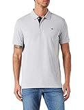 Polo clásico en colores lisos con pequeño logotipo bordado en contraste en el pecho