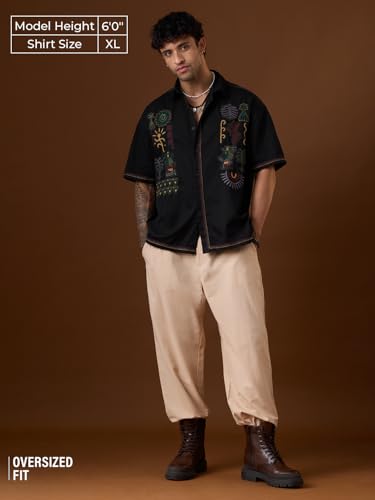 Image of The Souled Store Nomad: Tribe Men and Boys Short Sleeve Cuban Collar Black Embroidered Casual Drop Shoulder Trendy Streetwear Lightweight Cotton Oversized Shirt