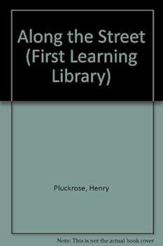 Paperback Along the Street (First Learning Library) Book