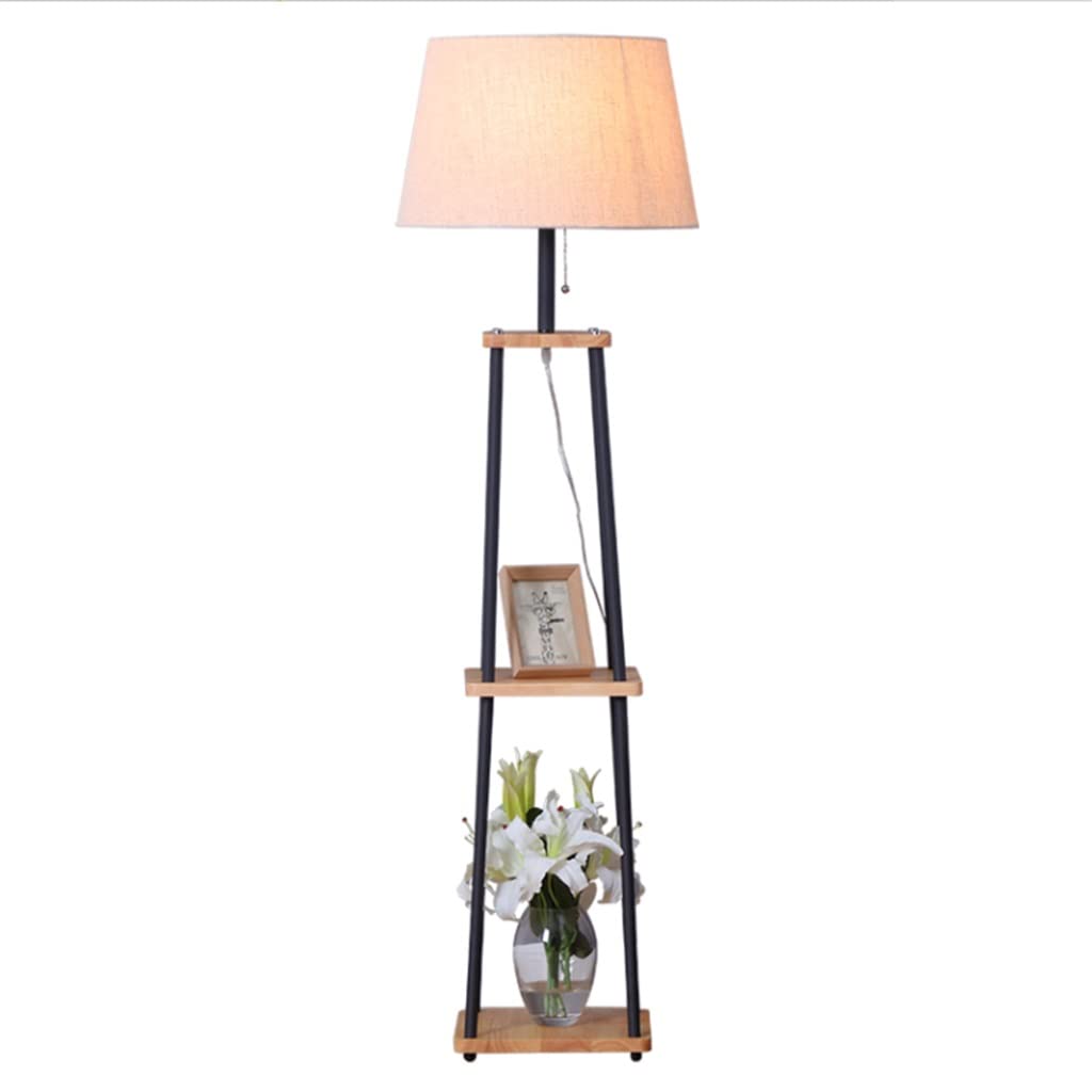 Lampadaire étagère créant une ambiance lecture cosy près du canapé de votre salon