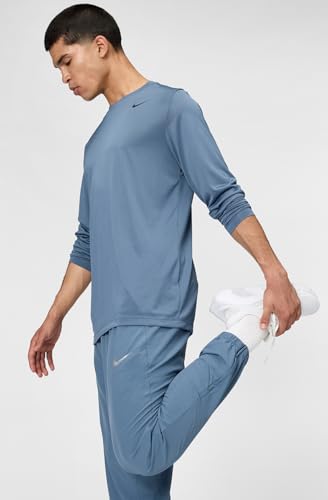 Image of Nike Men's Form Dri-FIT Tapered Versatile Pants