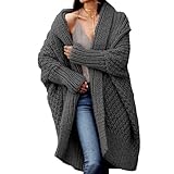 Confectionné en maille torsadée complexe, ce cardigan apporte volume et chaleur. Son tissage épais emprisonne efficacement la chaleur tout en conservant une allure élégante et confortable, idéale pour la superposition.