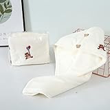 Ensemble de serviettes douces et absorbantes pour une expérience de type spa.