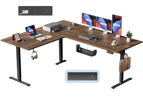 Image of 63x55 Inch L Shaped Electric Standing Desk, Corner Workstation, Dark Walnut | 3 AC outlets, 2 USB ports, cable tray, cord clips, 3 memory presets, anti-collision and 176 lb capacity for home office.