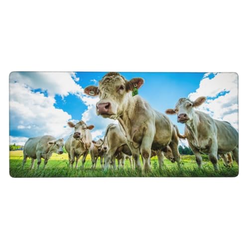 Tapis de souris grand format motif vache pour un espace de bureau bucolique et ordonné