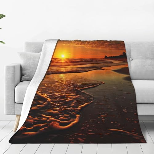 Couverture flanelle orange lever de soleil, un cocon de douceur chaude