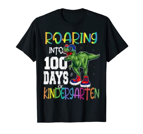 Roaring Into 100 giorni Kindergarten Funny T Rex Dinosaur Boy Maglietta