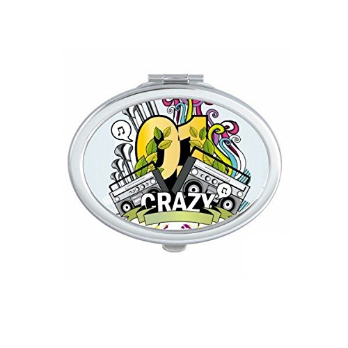 Miroir de poche portable ovale pour ajuster son maquillage n'importe où