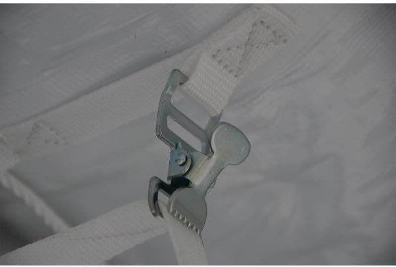 Close-up of a hand securing a tent top to the frame using a buckle and strap.