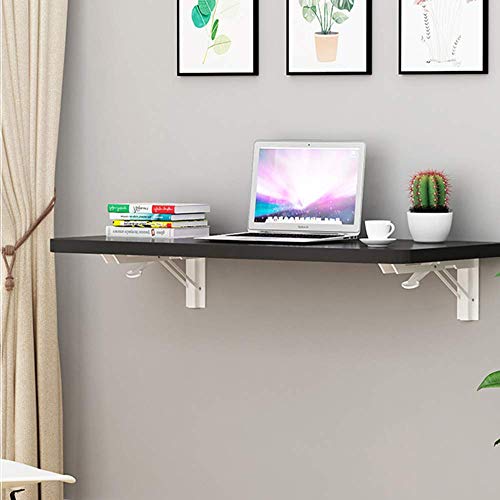 Table pliante murale résolvant le manque d'espace bureau