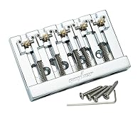Material: brass roller and zinc alloy saddle and body, good texture with fine workmanship, solid and durable to use. This bridge features roller saddles that effectively minimize string breakage while maintaining precise intonation and tuning stabili...