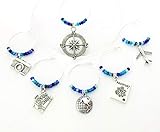 Travel themed Wine Charms: Charms include Camera, Compass, Suitcase, Globe, Passport, and an Airplane. Set of 6. MULTI-BLUE BEADS
