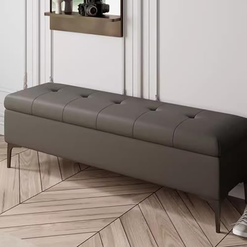 Banc de rangement ottoman en cuir et acier pour une entrée ordonnée