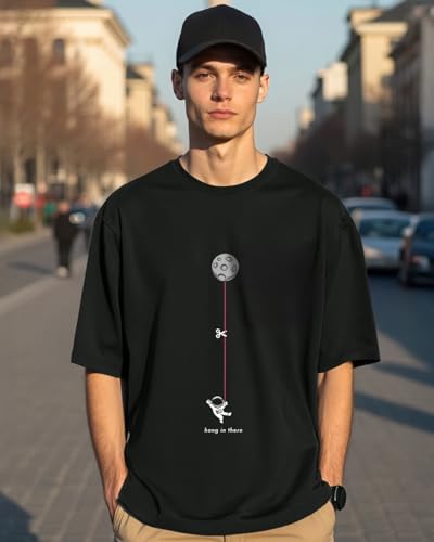 Image of Bewakoof Men's Hangin Astronaut Graphic Printed 100% Cotton T-Shirt - Oversized Fit, Round Neck, Half Sleeves