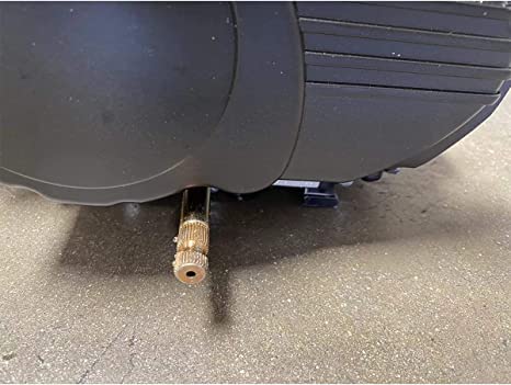 Close-up of the engine's oil drain plug