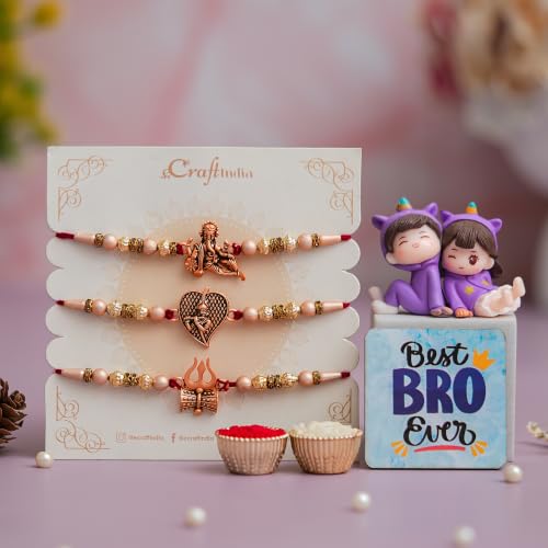 Image of eCraftIndia Set of 3 Designer Rakhis for Brother with Cute Brother-Sister Showpiece, Best Bro Ever Fridge Magnet & Roli Chawal Pack | Ganesha, Radha Krishna & Trishul Rakhi | Raksha Bandhan Gift