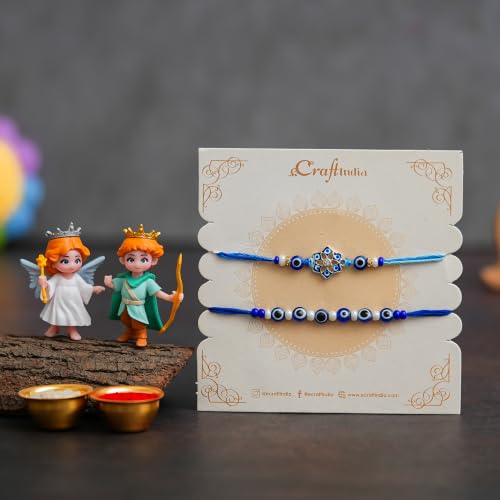 Image of eCraftIndia Designer Blue Evil Eye Rakhi Set of 2 with Angel & Archer Showpieces | Roli Chawal Included | Raksha Bandhan Gift for Brother