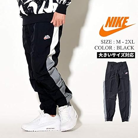 Amazon ナイキ Nike ナイロンパンツ 大きいサイズ メンズ Usaモデル トラックパンツ ワンポイント サイドライン スポーツ ジャージ ブラック 並行輸入品 ジャージボトム 通販