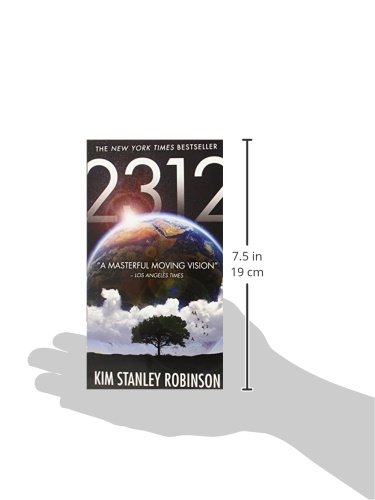 Side view of the book 2312 next to a ruler, indicating its dimensions.