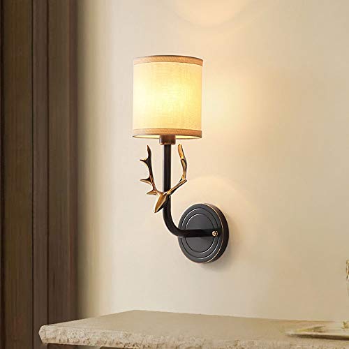 Applique murale tête de cerf dorée design luxe E14 pour salon chic