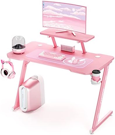 Intimate WM Heart Gaming Desk, 110cm Large Ergonomic Gaming Computer Desk, Carbon Fiber Table Top, E-Sports Desk with Adjustable Monitor Shelf, Rotatable Earphone, Cup, Handle Holders (Pink)