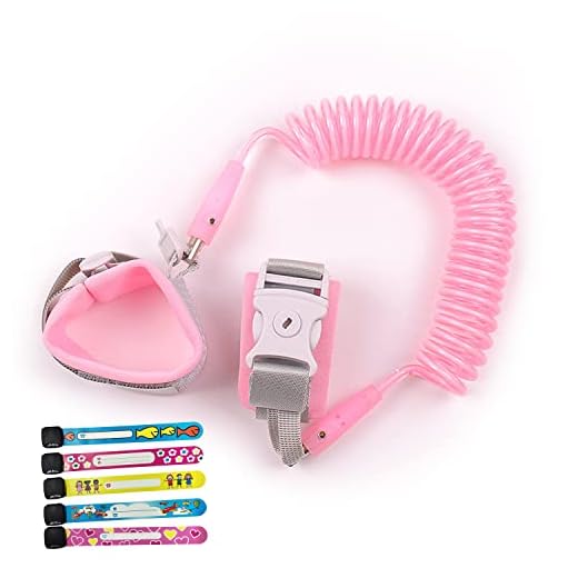 Pulsera antipérdida de 1,5 m, cadena de muñeca de seguridad antipérdida para bebés y niños, correa de mano con rienda elástica giratoria de 5 pulseras de identificación para niños. (Rosa claro)