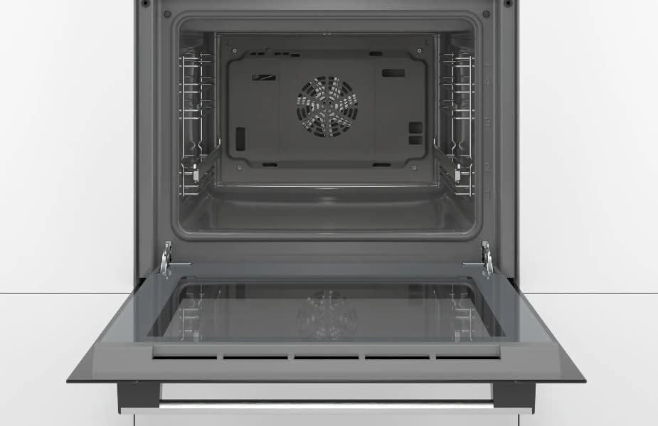 Интерьер view of the Bosch oven with the door fully open, showing the cavity and fan.