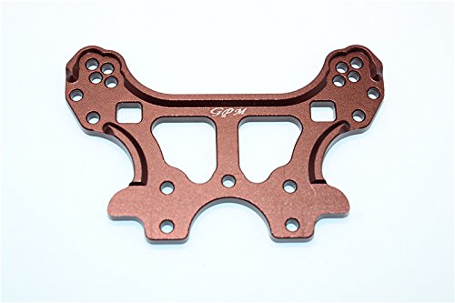 This front damper tower has multiple holes for setting different angles of the shock absorbers to suit different race tracks.