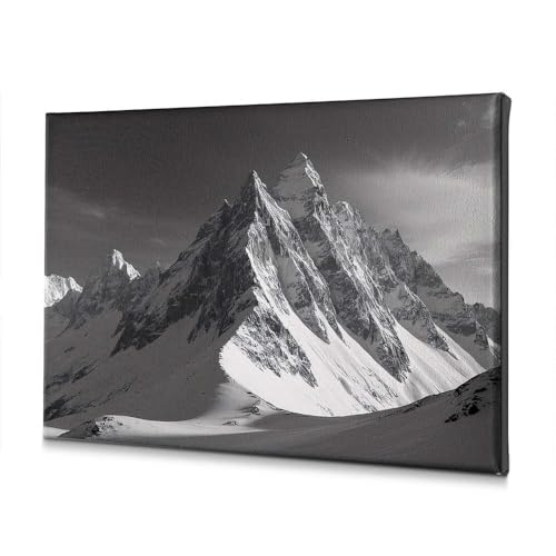 Tableau toile plaques enneigées illumine un mur sombre 30x40