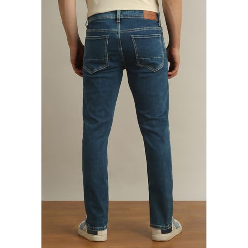 Image of Peter England Men's Slim Tapered Jeans | Denim Mid Wash | Casual Wear | Modern Fit