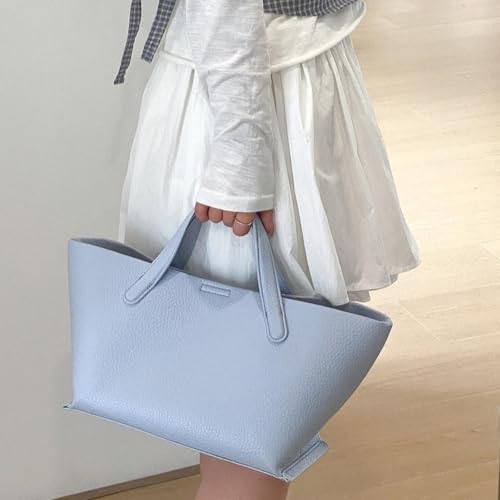 Sac à main en cuir synthétique spacieux avec fermeture pression