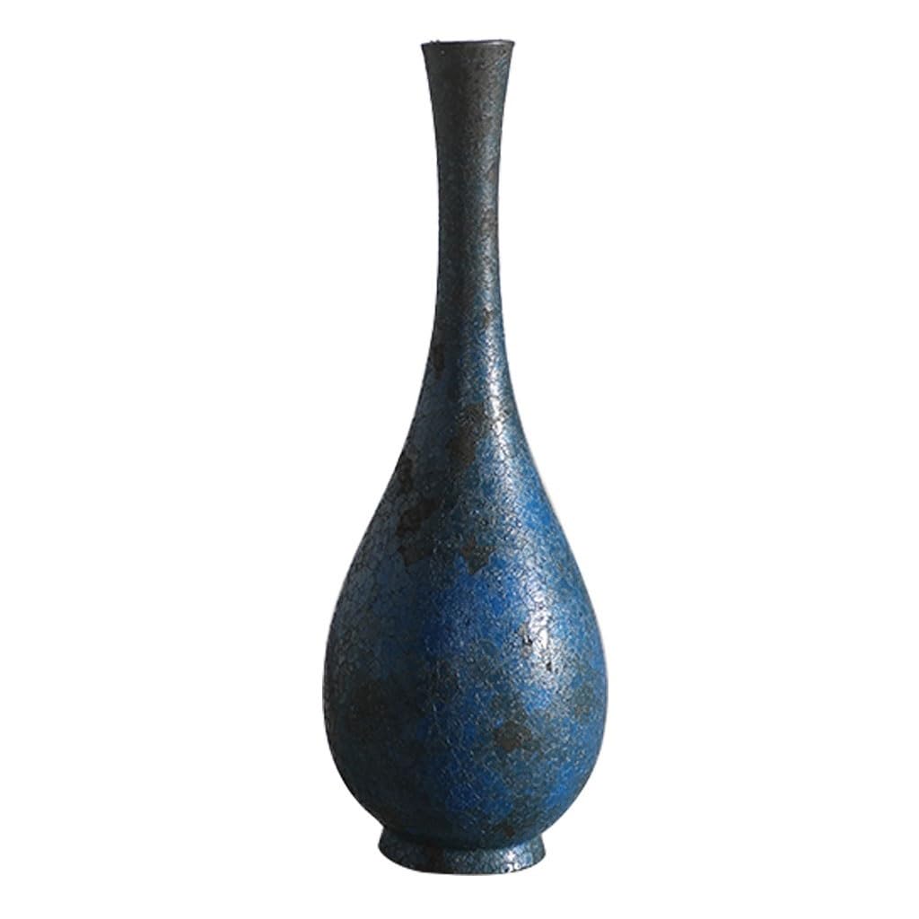 Vase céramique rétro bleu pour fleurs crée une ambiance zen au salon