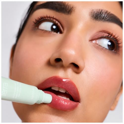 Image of Lip Ritual Lip Serum Gloss | Depigmenting, Hydrating & Plumping with Peptides, Niacinamide, & Vitamin C | Brightens Dark Lips & Evens Lip Tone | Clinically Proven for Dry, Chapped, Cracked & Pigmented Lips | 8ml