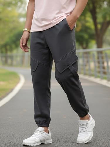 Image of Bewakoof Men's Cotton Super Loose Fit Joggers|Bewakoof Air 1.0 | Track pants for man | Lower for man | Trouser for men | Baggy trackpants for men | Multipurpose | Mens Lower Activewear | Utility Pockets | Lightweight & Flexible Elastic Waist | Casual Joggers | Loose Fit