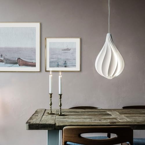 Lustre créateur danois pour éclairer une table sans éblouir