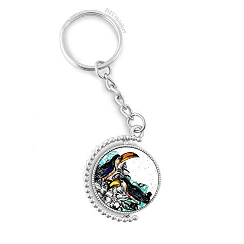 Porte-clé oiseau tropical rotatif Toco aux finitions soignées pour un trousseau élégant