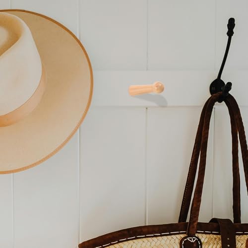 Ganchos de madera para pared rústicos que solucionan el caos en pasillos 8
