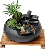 Débit d'eau relaxant : la fontaine en céramique contemporaine dispose d'une cascade d'eau lisse, offrant un paysage sonore apaisant qui contribue à votre détente et à votre bien-être.