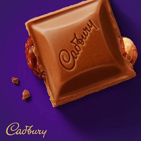 Image of Cadbury Dairy Milk Fruit & Nut Chocolate Bar - 110g By COUGAR | Milk Chocolate with Raisins & Almonds | Classic Fruit & Nut Flavour | Rich & Creamy Cadbury Treat (IMPORTED)
