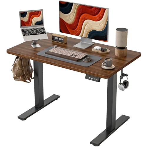 Image of TIQLAB Height Adjustable Electric Standing Desk, 40 x 24 inch, Sit Stand Up Desk, Splice Board, Computer Home Office Desk, Black Walnut Top