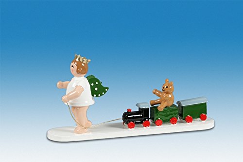 Ange de Noël en bois sculpté et son mini train miniature d'artisanat des montagnes