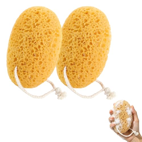 Two yellow foam bath sponges from Eiodoni shown side by side — proves the flat pad shape that differs from mesh balls