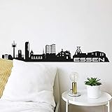 Die dekorative Skyline in schwarzer Farbe ist ein selbstklebendes Wandbild. Wählen Sie Ihre Lieblingsstadt.
