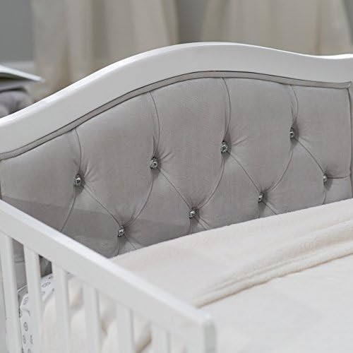 Orbelle Padded and upholstered Head and Footboard Upholstery is Ultra-Soft Micro-Fiber Polyester Decorative Crystal Dimensions: 53L x 30W x 27H in White Finish Fits a Standard Crib Mattress